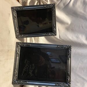 Like new. Set of 2 silver plated frames with velvet backings.  Both in perfect